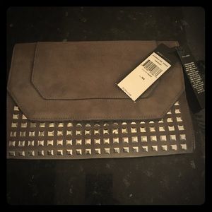 NWT BCBG, excellent condition, 10”x7”x1”